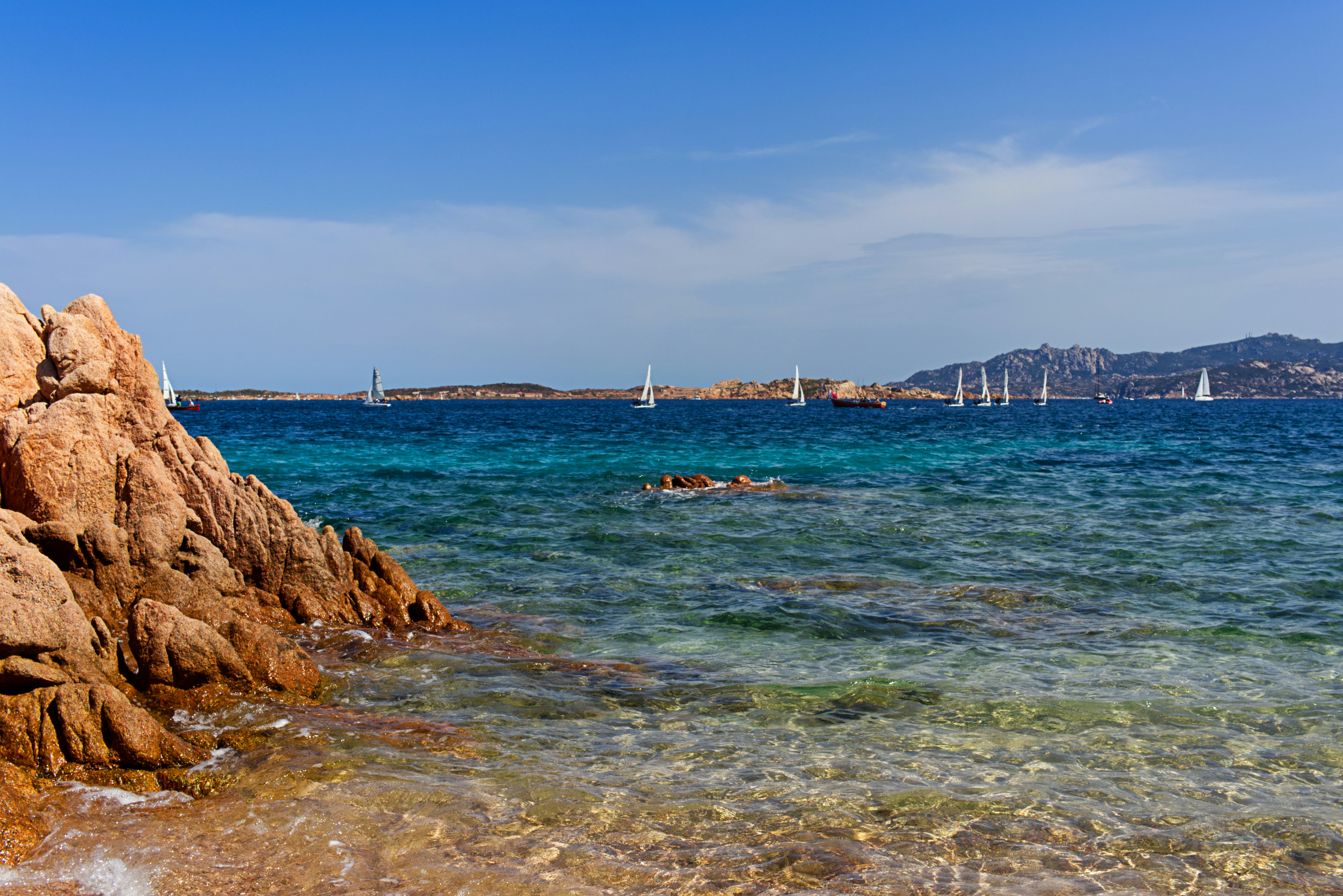 body of water under blue sky during daytime